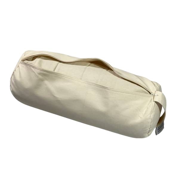 A natural cotton bolster unzipped showing the inner casing containing buckwheat